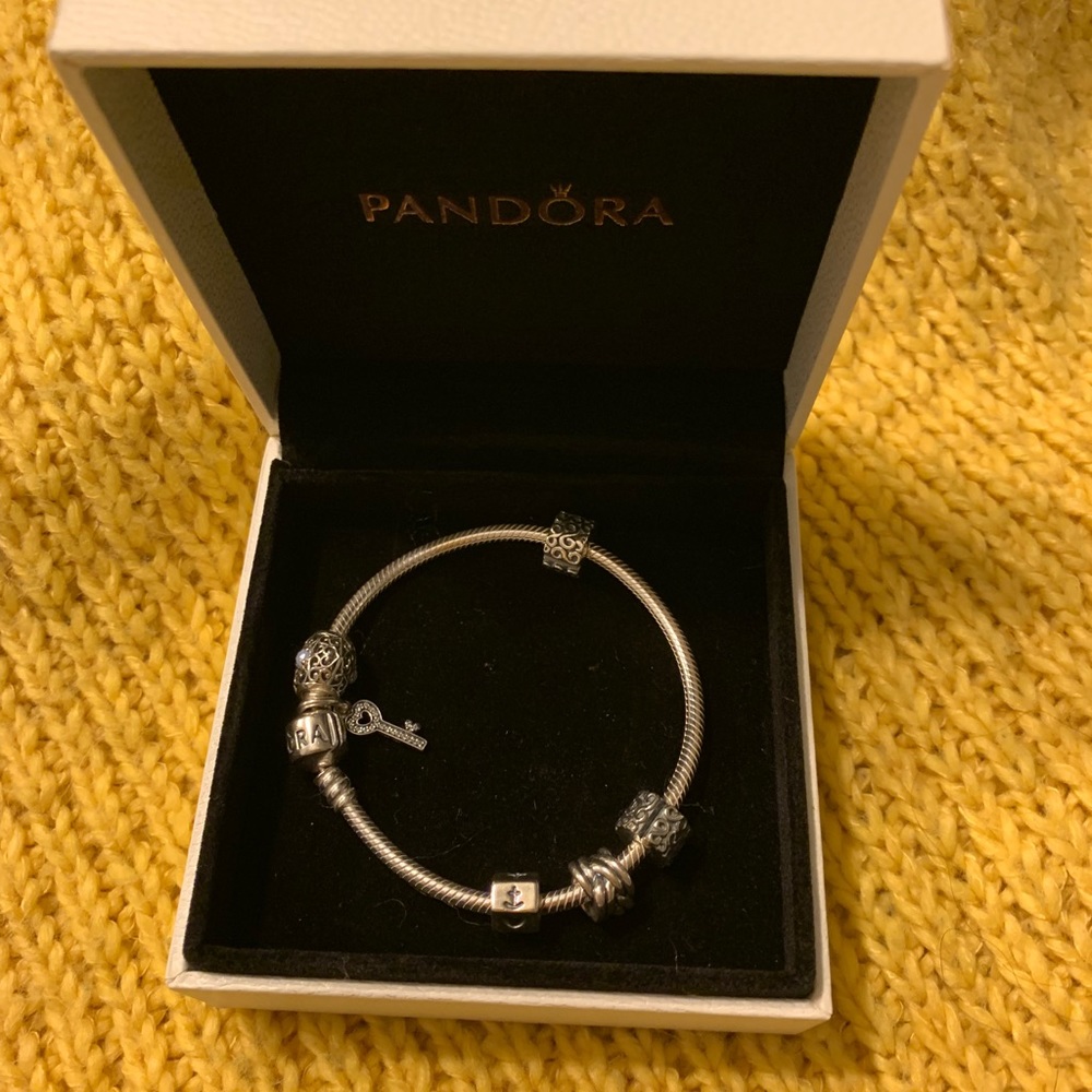 Pandora bracelet with charms and spacers!